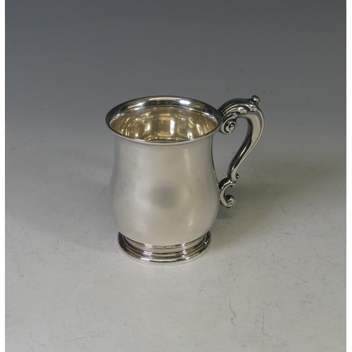 62 - A George V silver Mug, by William Neale & Son Ltd., hallmarked Birmingham, 1934, of baluster for... 