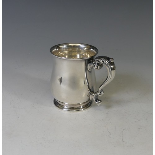 62 - A George V silver Mug, by William Neale & Son Ltd., hallmarked Birmingham, 1934, of baluster for... 