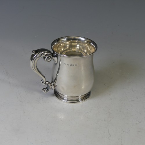 62 - A George V silver Mug, by William Neale & Son Ltd., hallmarked Birmingham, 1934, of baluster for... 