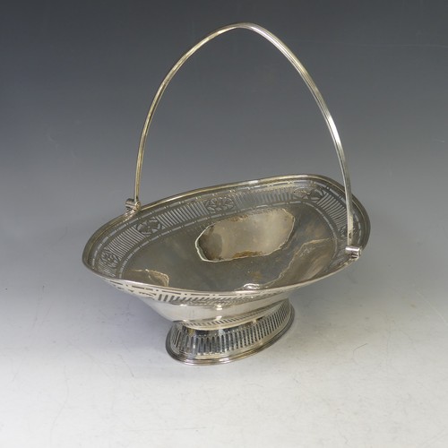 70 - A George III silver swing handled Basket, hallmarked London, 1788, makers mark 'I.M' or 'W.I', of ov... 