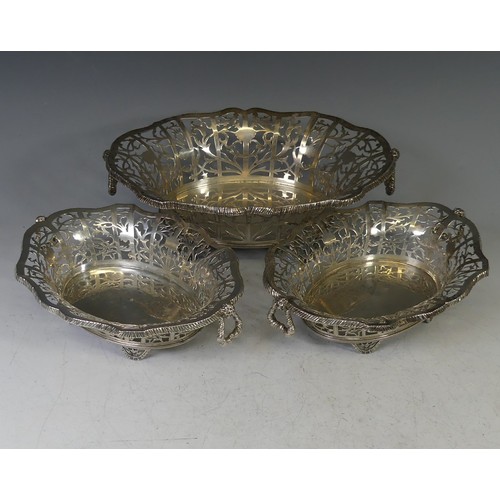 79 - A set of three George V silver Baskets, by William Comyns & Sons Ltd., hallmarked London 1920, o... 