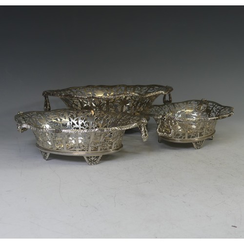 79 - A set of three George V silver Baskets, by William Comyns & Sons Ltd., hallmarked London 1920, o... 