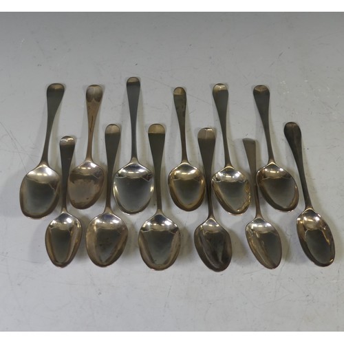 95 - A collection of twelve mid 18thC silver picture back Teaspoons, with scroll and foliate backs, vario... 