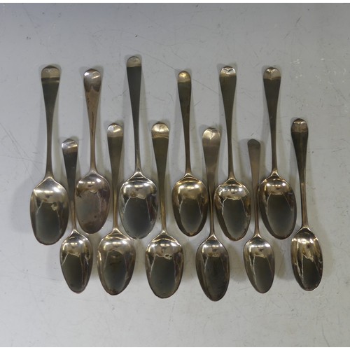 95 - A collection of twelve mid 18thC silver picture back Teaspoons, with scroll and foliate backs, vario... 