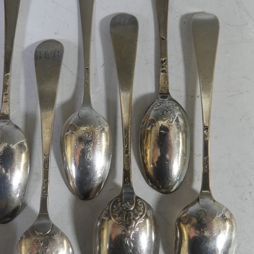 95 - A collection of twelve mid 18thC silver picture back Teaspoons, with scroll and foliate backs, vario... 