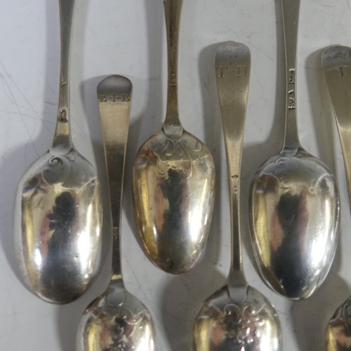 95 - A collection of twelve mid 18thC silver picture back Teaspoons, with scroll and foliate backs, vario... 