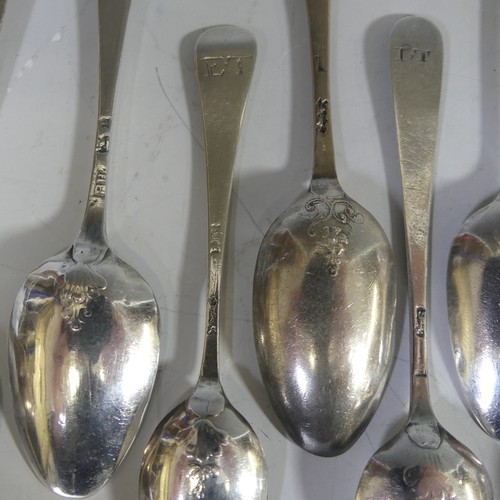 96 - A collection of sixteen mid 18thC silver Teaspoons, various makers, the bowls all with fancy / pictu... 