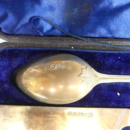 99 - A cased Victorian silver Knife, Fork and Spoon Set, by Martin, Hall & Co., hallmarked Sheffield,... 