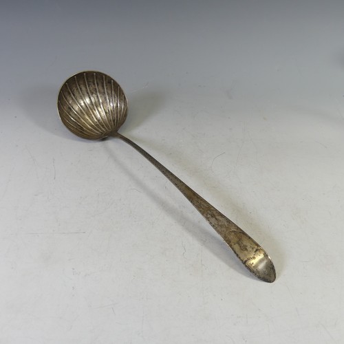 100 - A George III Irish Silver Soup Ladle, by John Shiels, hallmarked Dublin 1774, Celtic point with shel... 