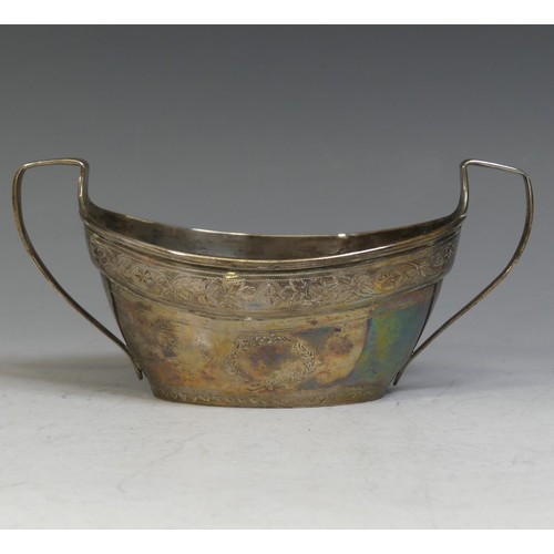 101 - A George III silver two handled Sugar Bowl, marks punched into the band of bright cut decoration and... 