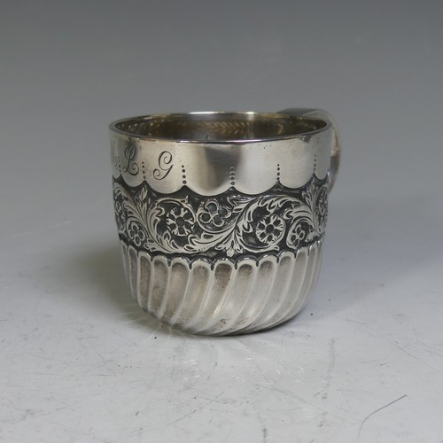 84 - A Victorian silver Mug, by Josiah Williams & Co., hallmarked London, 1894, demi-fluted with a ce... 