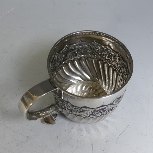 84 - A Victorian silver Mug, by Josiah Williams & Co., hallmarked London, 1894, demi-fluted with a ce... 