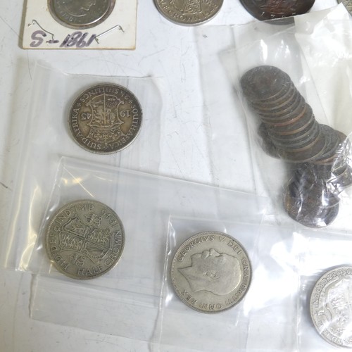 77 - A small quantity of Pre-1947 silver Coins, including 8 George V half crowns, loose, 3.8ozt, a coin s... 