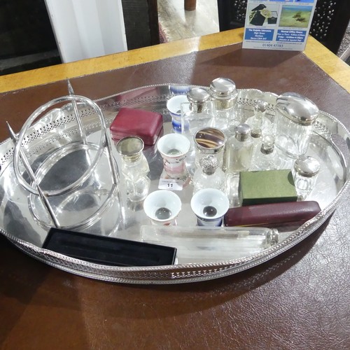 11 - A quantity of silver mounted Dressing Table Jars and Bottles, together with two rolled gold propelli... 