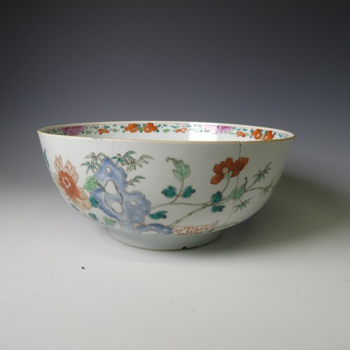 140 - A 19thC Chinese porcelain famille rose Bowl, decorated with figures and fauna enclosed with scale de... 