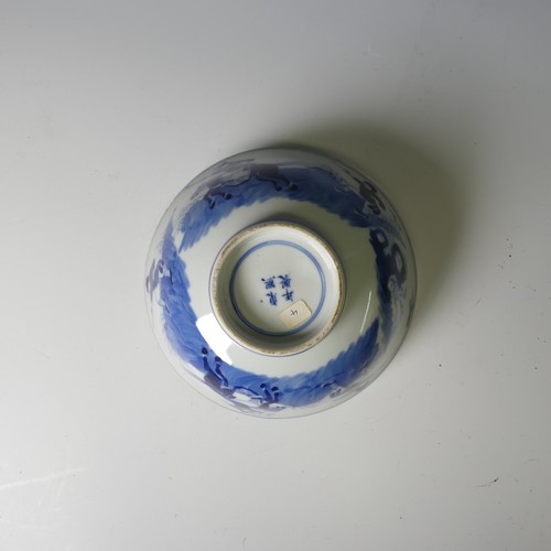 141 - An antique Chinese blue and white Bowl, depicting warriors on horseback and the interior with floral... 