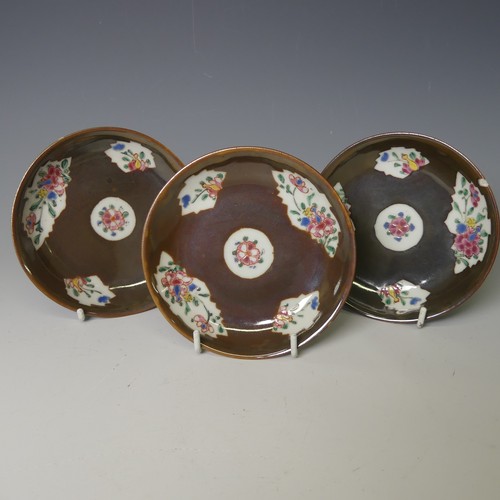 148 - A pair of 18thC Chinese cafe-au-lait famille rose Bowls, the brown ground interspersed with shaped a... 