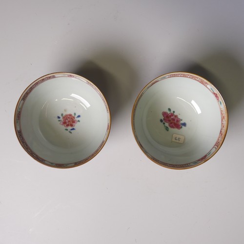 148 - A pair of 18thC Chinese cafe-au-lait famille rose Bowls, the brown ground interspersed with shaped a... 