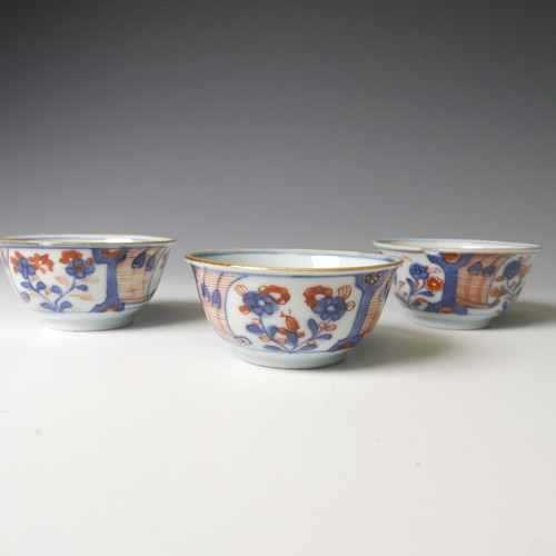 153 - A set of three 19thC Chinese imari palette Teabowls, D 8cm, with corresponding Saucer, D 12cm, decor... 