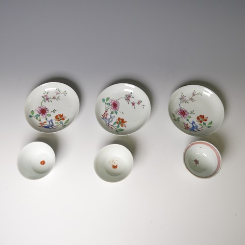 154 - A pair of 19thC Chinese famille rose porcelain Teabowls, decorated in enamels of flora, D 8cm, with ... 