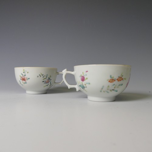 154 - A pair of 19thC Chinese famille rose porcelain Teabowls, decorated in enamels of flora, D 8cm, with ... 