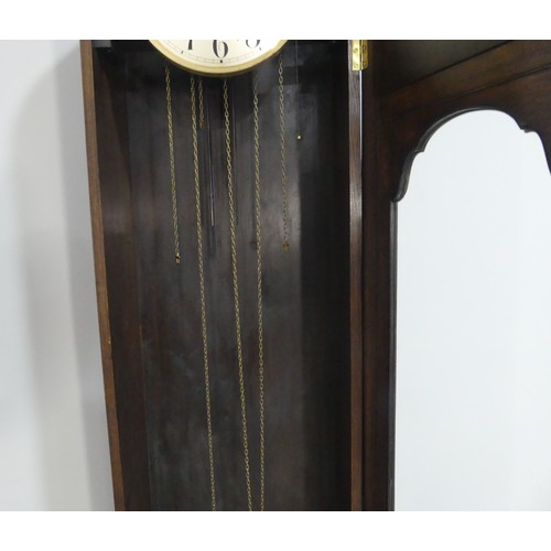 258 - A 1930's oak cased Westminster chiming Longcase Clock, with silvered dial and Arabic chapter ring, c... 