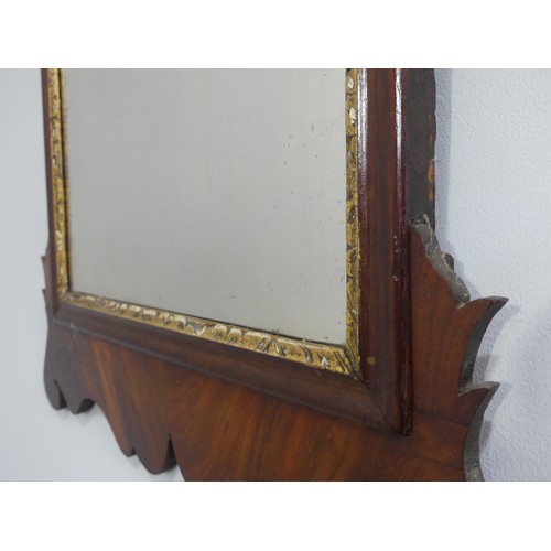 321 - Georgian style walnut fretwork Wall Mirror. with gilt decoration, H:72cm x W:43cm.