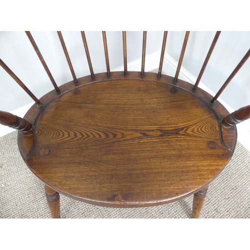 328 - A late 19th century ash and elm Windsor Chair, with stick back and shaped seat, on turned legs joine... 