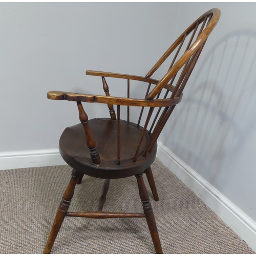 328 - A late 19th century ash and elm Windsor Chair, with stick back and shaped seat, on turned legs joine... 