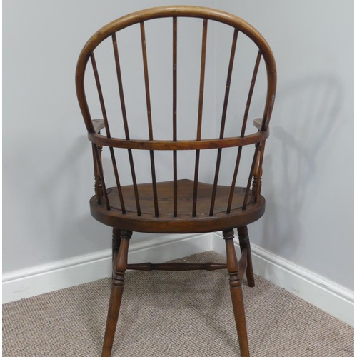 328 - A late 19th century ash and elm Windsor Chair, with stick back and shaped seat, on turned legs joine... 