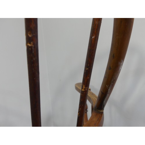 328 - A late 19th century ash and elm Windsor Chair, with stick back and shaped seat, on turned legs joine... 