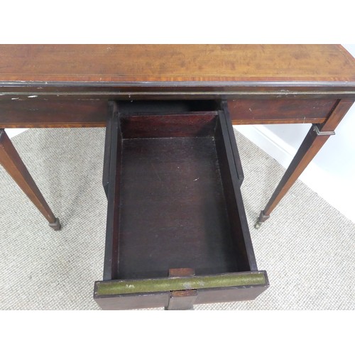 331 - An Edwardian mahogany inlaid demi-lune Card Table, with fold-over top lined with baize, raised on sq... 