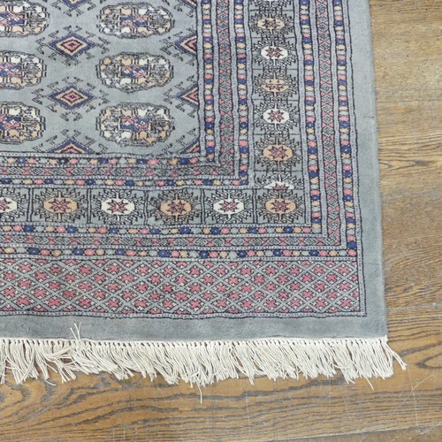 487 - Tribal Rugs; a finely hand-knotted Bokhara rug, grey ground, wool pile on cotton base, 126cm x 202cm... 