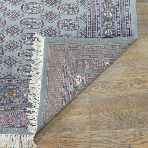 487 - Tribal Rugs; a finely hand-knotted Bokhara rug, grey ground, wool pile on cotton base, 126cm x 202cm... 