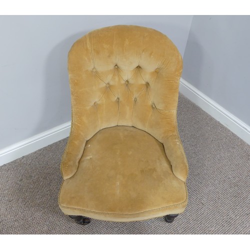 333 - A Victorian upholstered Nursing Chair, with yellow velvet upholstery, on turned front legs with cast... 