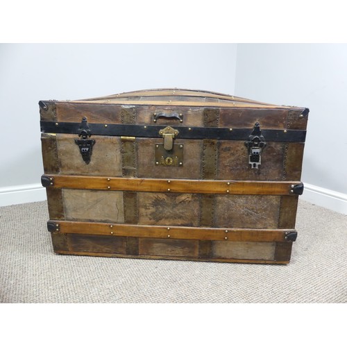 334 - A Victorian metal bound dome-topped Trunk, with leather carrying handles, W 92cm x D 52cm x H 65cm.... 