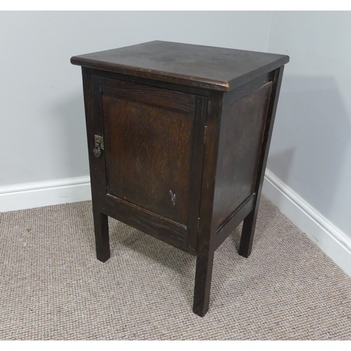 339 - Two associated oak bedside cupboards paired with a 19thC mahogany toilet mirror, latch on the conver... 