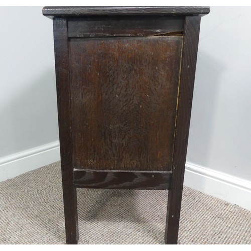 339 - Two associated oak bedside cupboards paired with a 19thC mahogany toilet mirror, latch on the conver... 