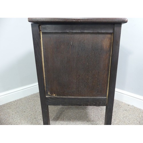 339 - Two associated oak bedside cupboards paired with a 19thC mahogany toilet mirror, latch on the conver... 