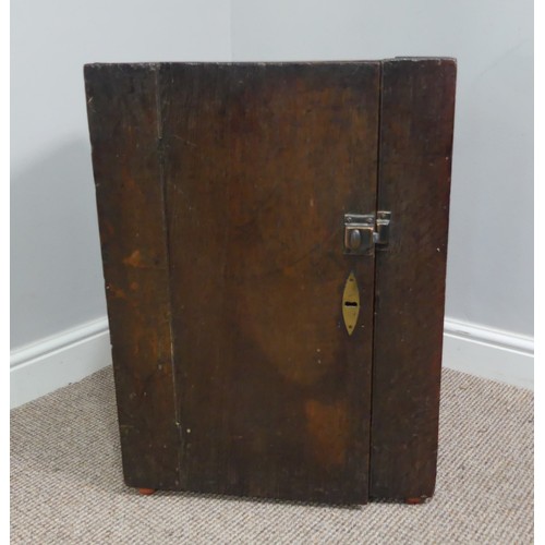 339 - Two associated oak bedside cupboards paired with a 19thC mahogany toilet mirror, latch on the conver... 