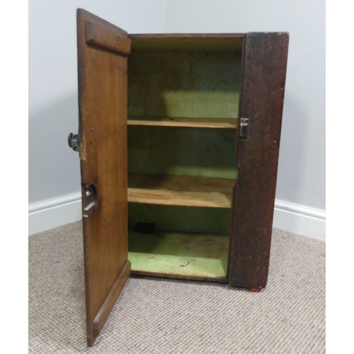 339 - Two associated oak bedside cupboards paired with a 19thC mahogany toilet mirror, latch on the conver... 