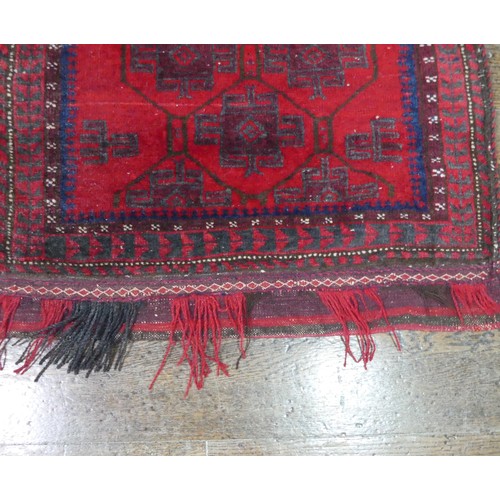 488 - Tribal Rugs; a Baluchi Tent Hanging, finely knotted with short pile, edges and fringing worn, 135cm ... 