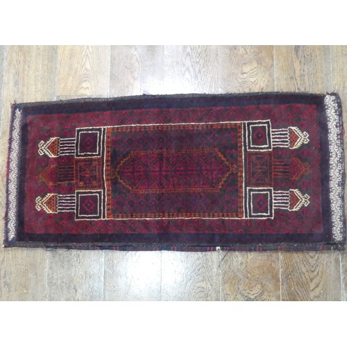 488 - Tribal Rugs; a Baluchi Tent Hanging, finely knotted with short pile, edges and fringing worn, 135cm ... 