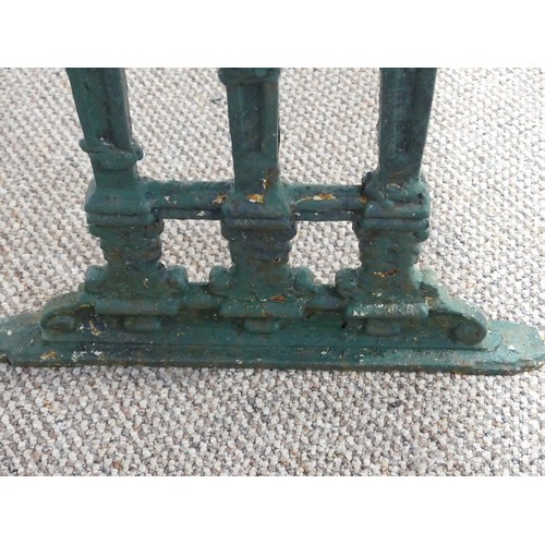 495 - Garden Furniture; a vintage green-painted cast iron Garden Table, the rectangular plank top, above a... 