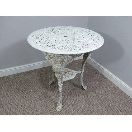 497 - Garden Furniture; a vintage white painted cast iron circular Garden Table, with under tier on heavil... 