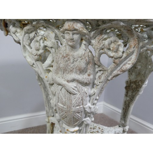 497 - Garden Furniture; a vintage white painted cast iron circular Garden Table, with under tier on heavil... 