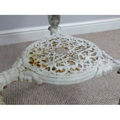 497 - Garden Furniture; a vintage white painted cast iron circular Garden Table, with under tier on heavil... 