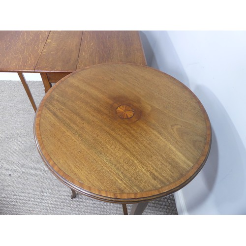 352 - An Edwardian oak Sutherland table, with canted corners to the rectangular top mounted on square legs... 