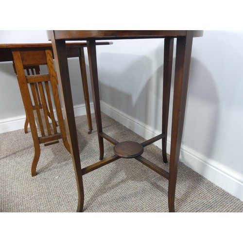 352 - An Edwardian oak Sutherland table, with canted corners to the rectangular top mounted on square legs... 