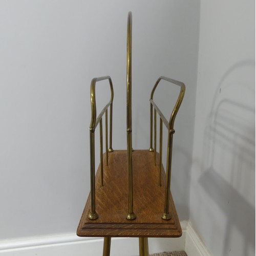 353 - An early 20th century brass and oak Magazine Stand, W 37cm x H 79cm x D 37cm.